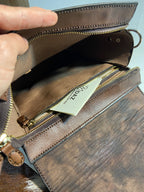 Vegetable tanned crossbody bag